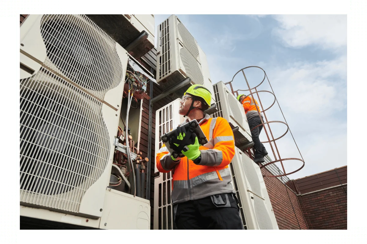 aircon contractor checking diligently the ac units