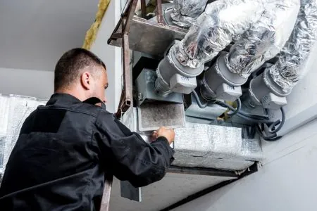 technician cleaning residential vent in Albuquerque for Cleaner Air